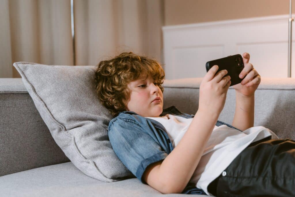 child with ASD using digital device