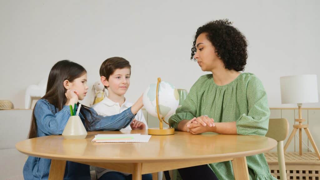 Children learning from their mother