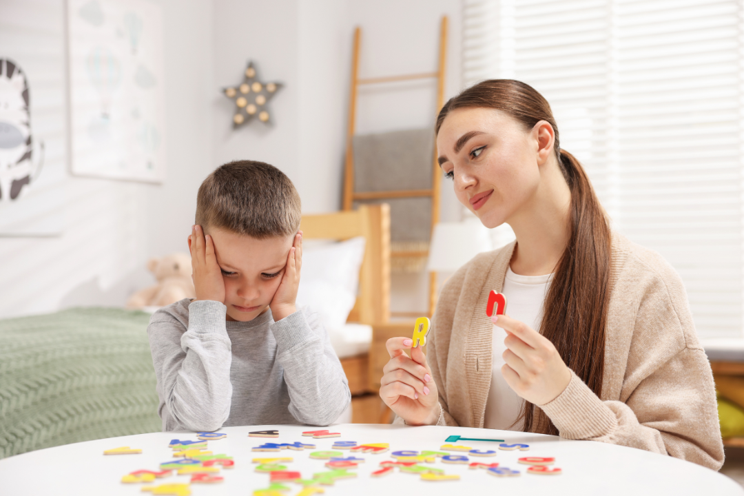 Kid learning alphabet